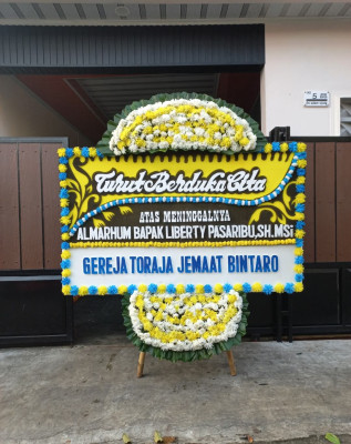 Papan Bunga Duka di Dorbolaang